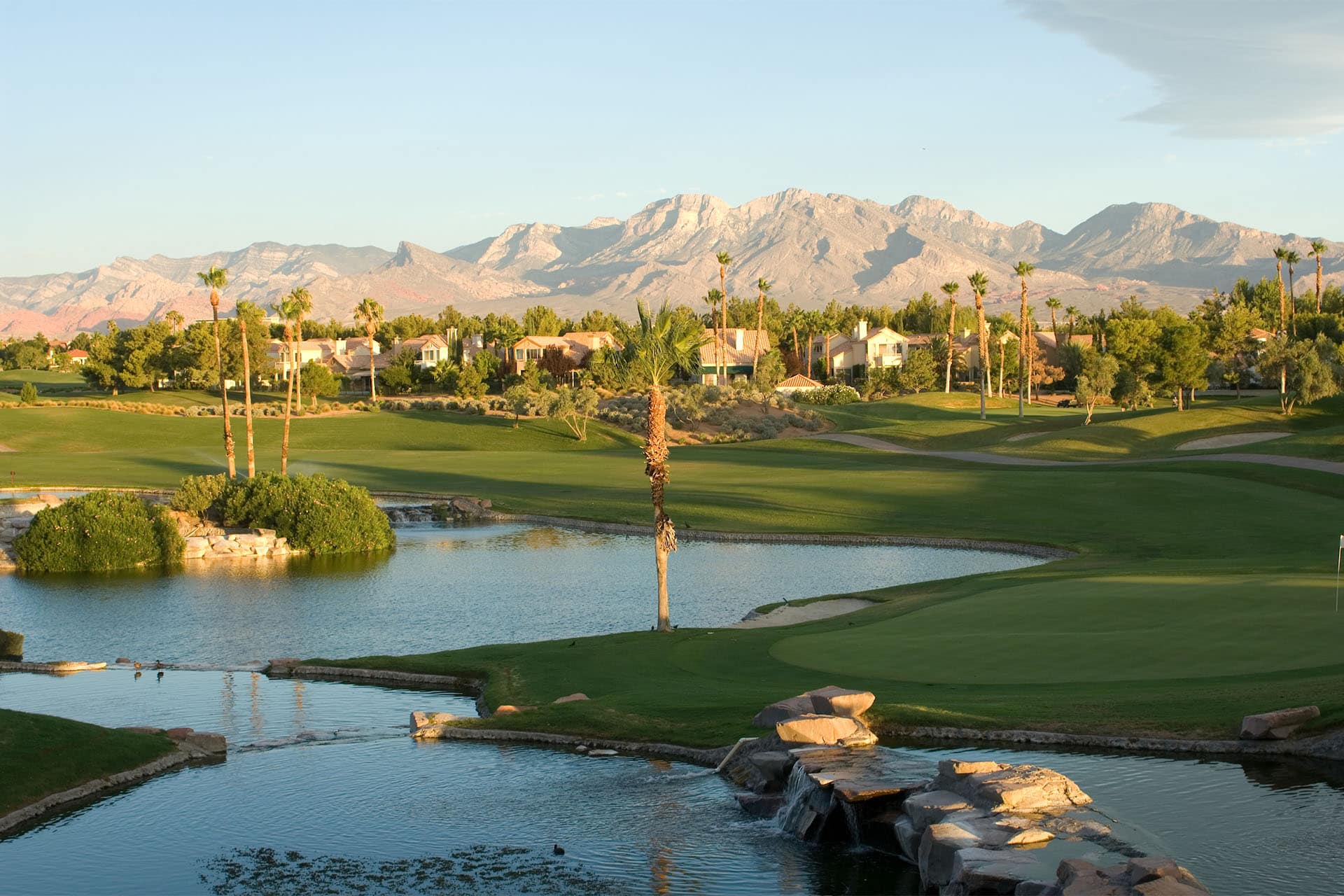 Close-up of a golf ball next to the hole